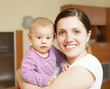 Portrait of happy woman with toddler