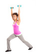 Woman Exercising With Dumbbells