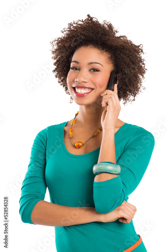 Photo: Young Woman Talking On Mobile Young Woman Talking On Mobile