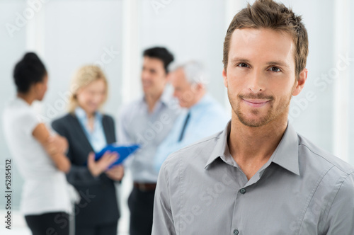 Photo: Portrait Of Young Businessman Portrait Of Young Businessman