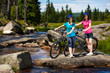 Foto: Two women riding bikes Two women riding bikes