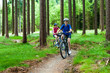 Two women riding bikes
