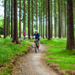 Two women riding bikes
