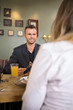 Businessman Having Meal With Female Colleague