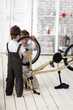 two boy  repairing bicycle