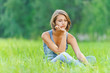 Photo: young woman sitting grass young woman sitting grass