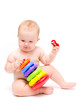 Baby with a toy and pacifier