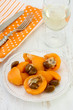 medlar on white plate