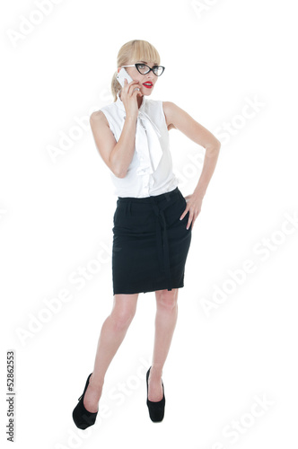 Photo: Sexy blonde business woman using smartphone wearing glasses. Sexy blonde business woman using smartphone wearing glasses.