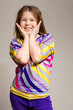 Happy funny little girl smiling