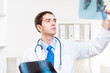 Doctor looking the x-ray