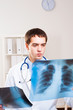 Doctor looking the x-ray