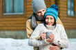 Photo: Half-length portrait of embracing couple drinking tea Half-length portrait of embracing couple drinking tea