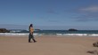 Video: pregnant woman walking at beach pregnant woman walking at beach