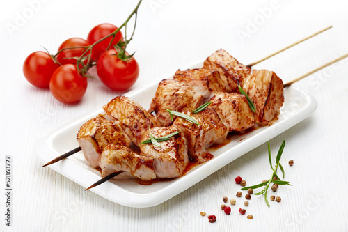 Photo: grilled pork meat on white plate, pork barbecue grilled pork meat on white plate, pork barbecue