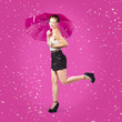 Photo: Smiling female model dancing in falling rain Smiling female model dancing in falling rain