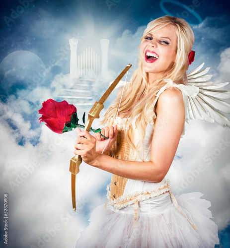 Photo: Heavenly angel of love with flower arrow Heavenly angel of love with flower arrow