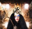 Luxury medieval queen in exclusive gold crown