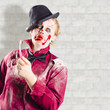 Possessed girl with bloody toothbrush. Gum disease