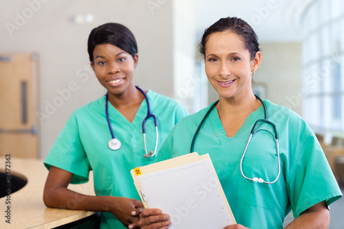 Photo: Nurses at work station Nurses at work station