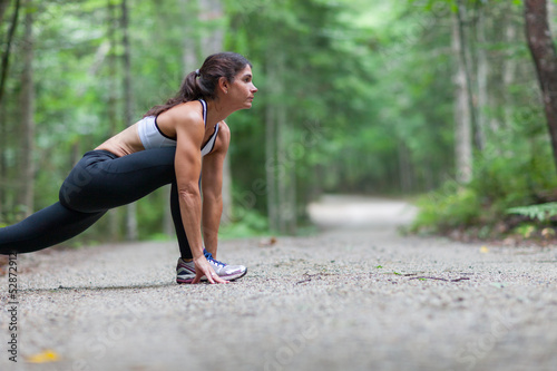 Photo: Middle aged woman stretching Middle aged woman stretching