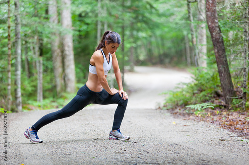 Photo: Middle aged woman stretching Middle aged woman stretching