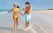 Couple running on Beach
