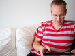 Man reading on a tablet