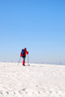 man on the snow with cross-country skiing