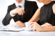canvas print picture - woman hand signing contract paper