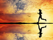 Girl running at sunset