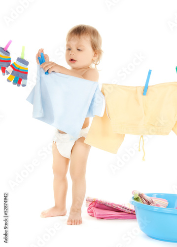 Photo: baby doing laundry baby doing laundry