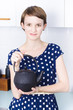 Woman with tea kettle