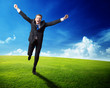 happy business man running on spring field