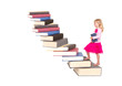 child climbing staircase of books