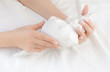 Manicured woman's hands holds sea shell