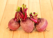 Young beets on wooden table close-up