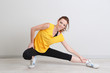 Portrait of beautiful young woman exercises