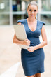 Business woman holding a laptop