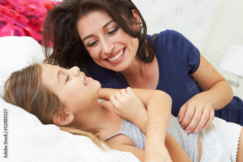 Photo: Mother And Daughter Lying In Bed Together Mother And Daughter Lying In Bed Together