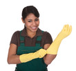 Young Female Gardner Wearing Gloves