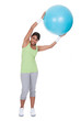 Photo: Young Woman Exercising With Pilates Ball Young Woman Exercising With Pilates Ball