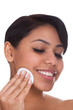 Young Woman Wiping Face With A Pad