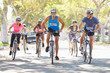 Group Of Cyclists On Suburban Street