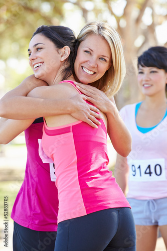 Photo: Female Runners Congratulating One Another After Race Female Runners Congratulating One Another After Race