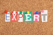 The word Expert on a Cork Board