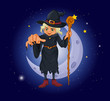 Vector: A witch holding a stick in front of the moon A witch holding a stick in front of the moon