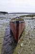 Used Canoe At Low Tide