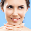 Portrait of beautiful woman, on blue