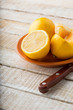 Fresh citrus on plate on table